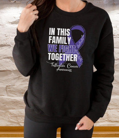 a woman wearing a black sweatshirt with a purple ribbon on it