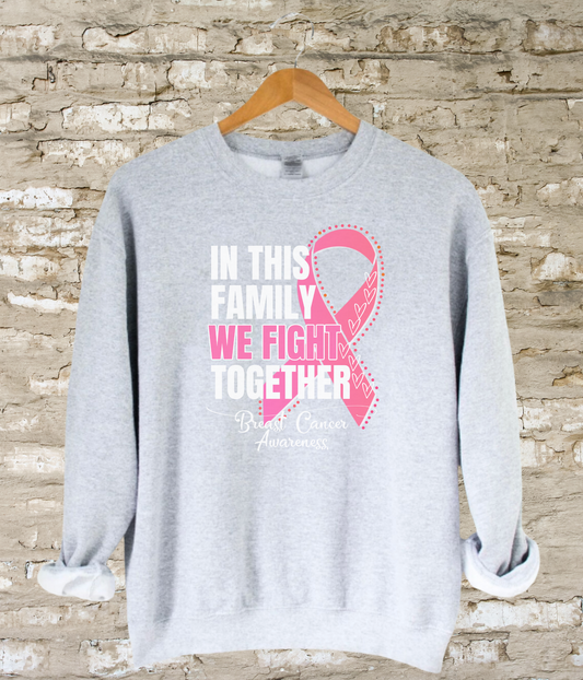 a sweatshirt with a pink ribbon on it that says in this family we fight together