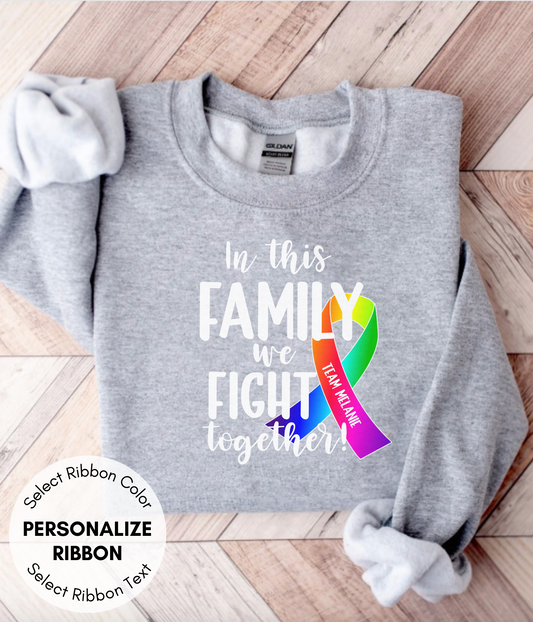 a gray shirt with a rainbow ribbon on it