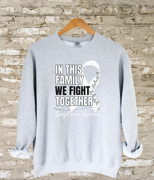 a grey sweatshirt with a white ribbon on it