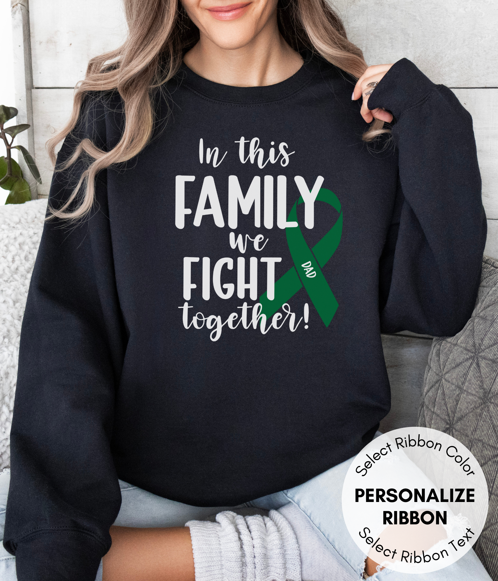 a woman wearing a sweatshirt that says in this family we fight together