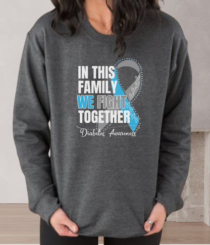 a woman wearing a sweatshirt that says in this family we fight together