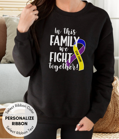 a woman wearing a sweatshirt that says in this family we fight together