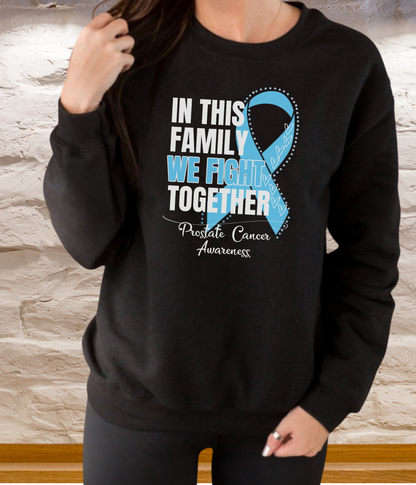 a woman wearing a black sweatshirt with a blue ribbon on it