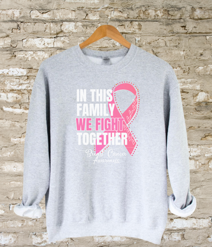 a sweatshirt with a pink ribbon on it that says in this family we fight together