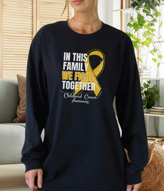 a woman wearing a t - shirt that says in this family we fight together