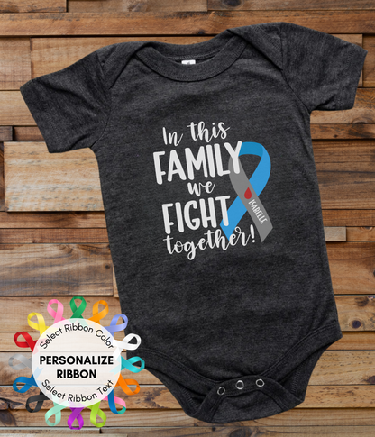 a black onesuit with a blue ribbon on it and the words in this family