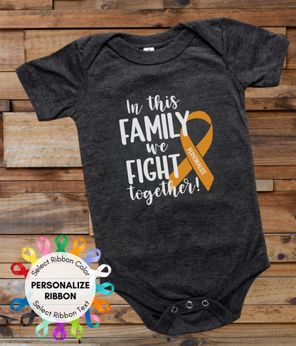 a black onesuit with an orange ribbon in this family we fight together