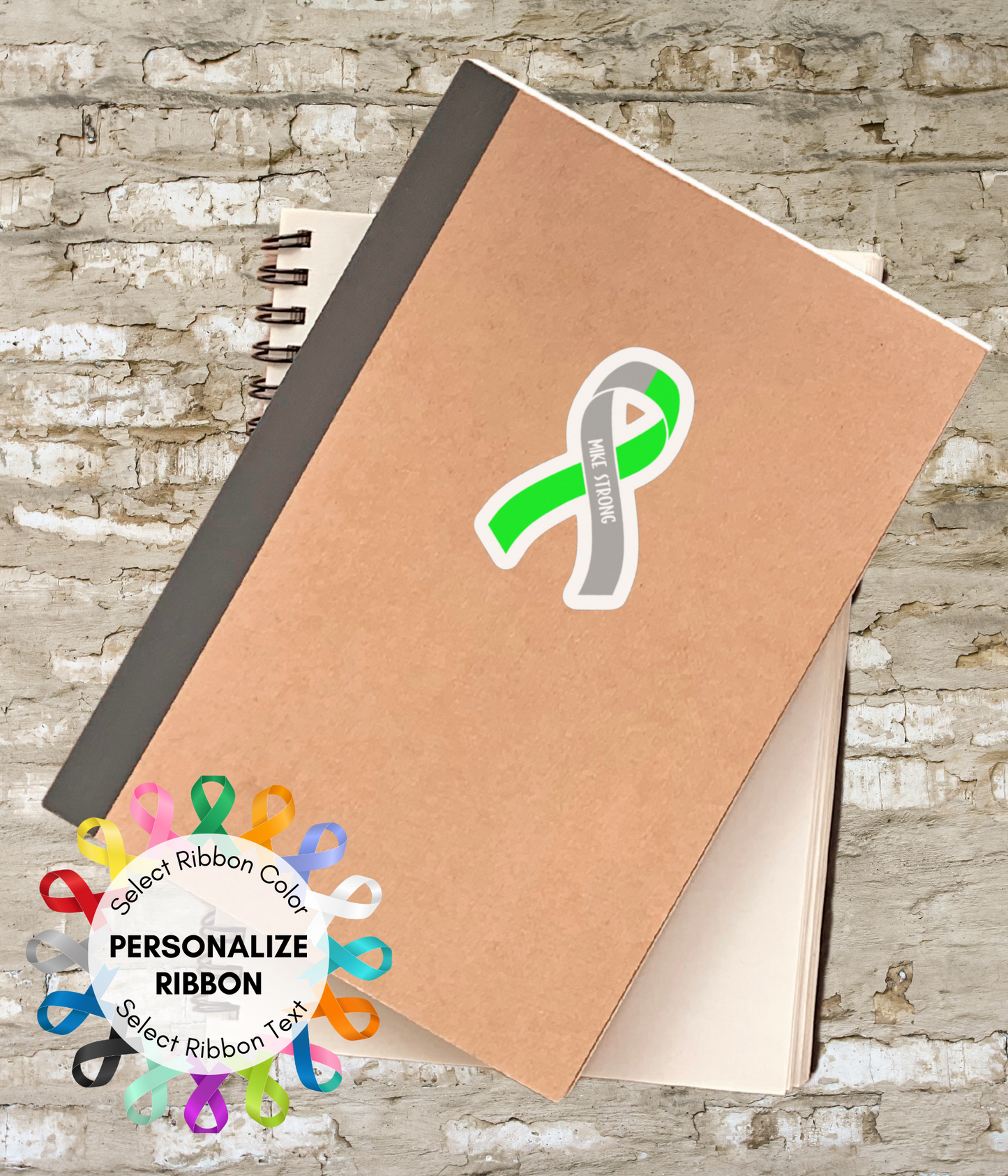 a notebook with a green ribbon on it