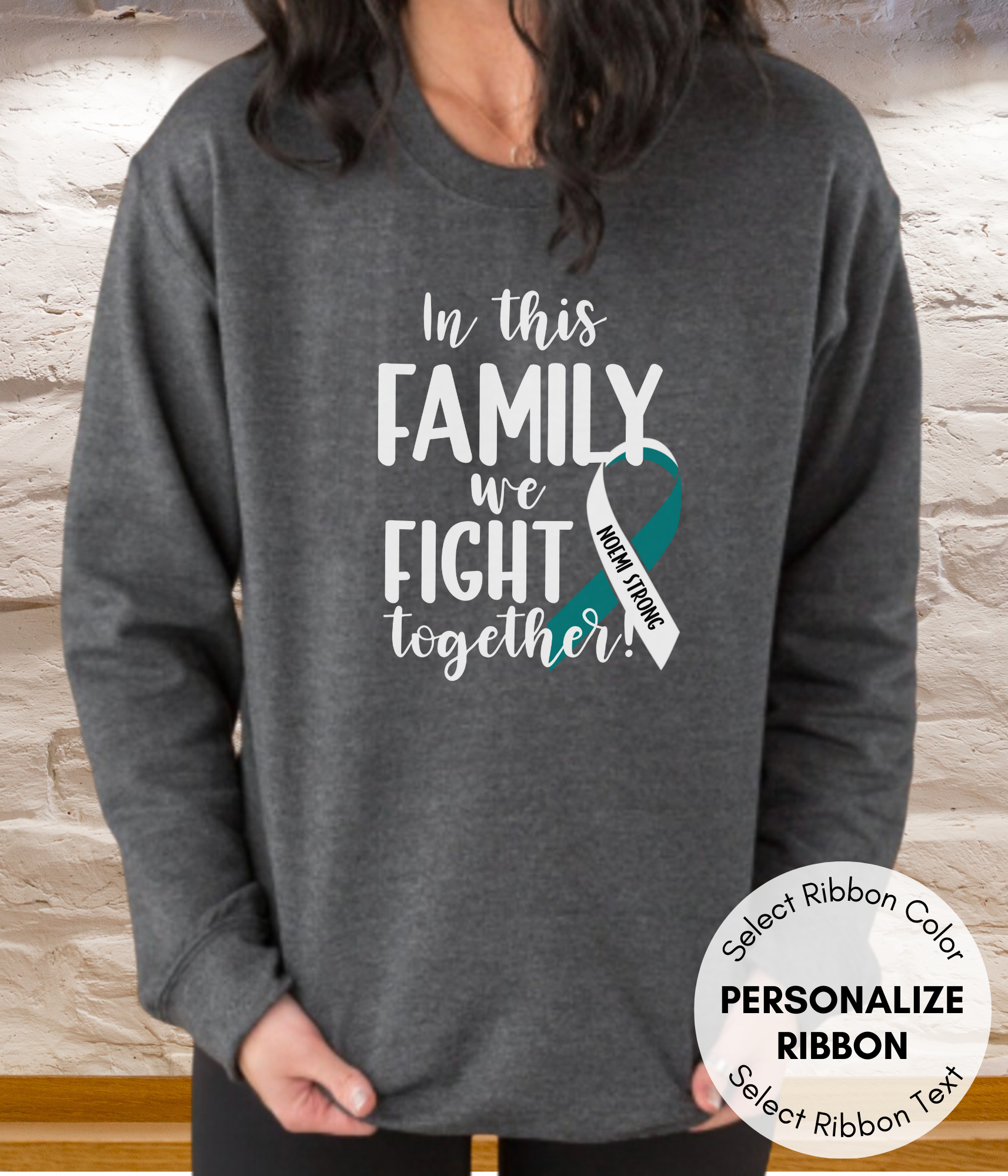 a woman wearing a sweatshirt that says in this family we fight together